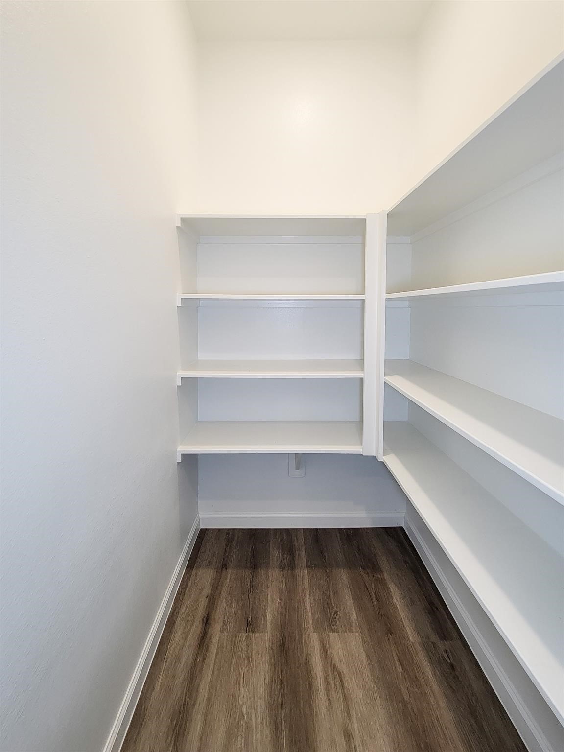 94 Valiant Ridge Trail Magnolia, TX 77354 - Photo 39 of 45 a view of walk in closet with empty racks