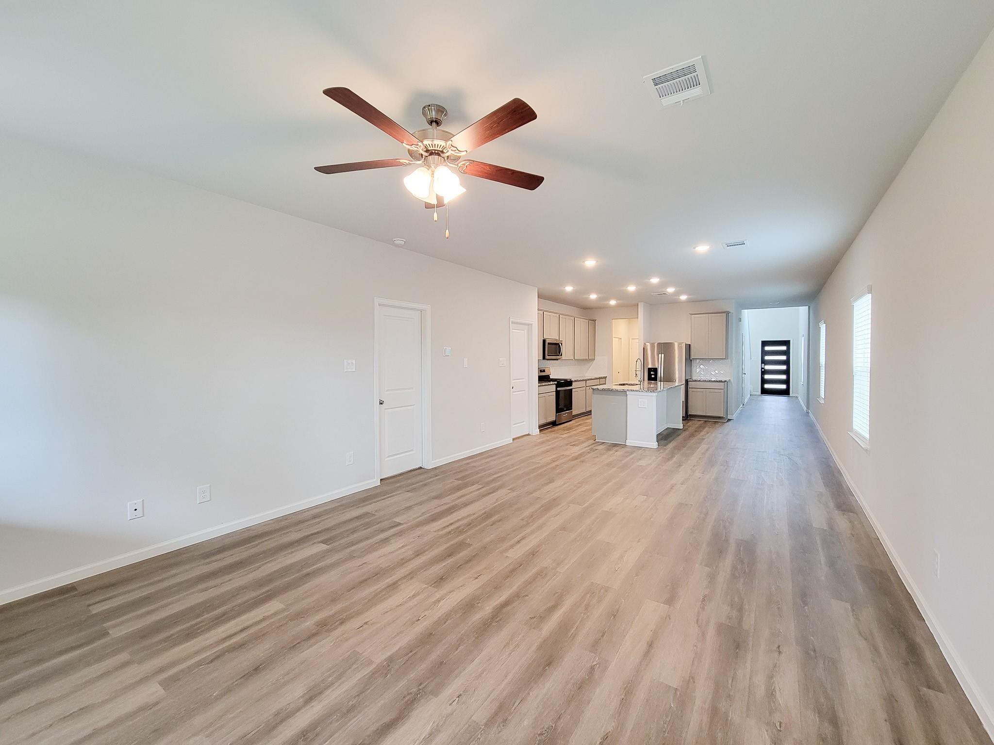 94 Valiant Ridge Trail Magnolia, TX 77354 - Photo 41 of 45 a view of a kitchen with a sink and a window