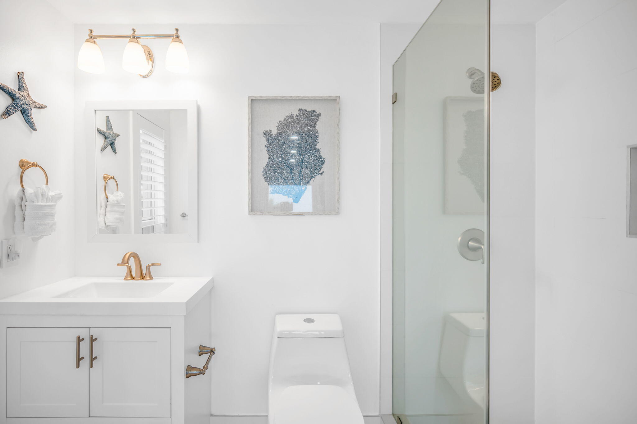 82 Tingler Lane Marathon, FL 33050 - Photo 17 of 54 a bathroom with a sink a mirror and a shower