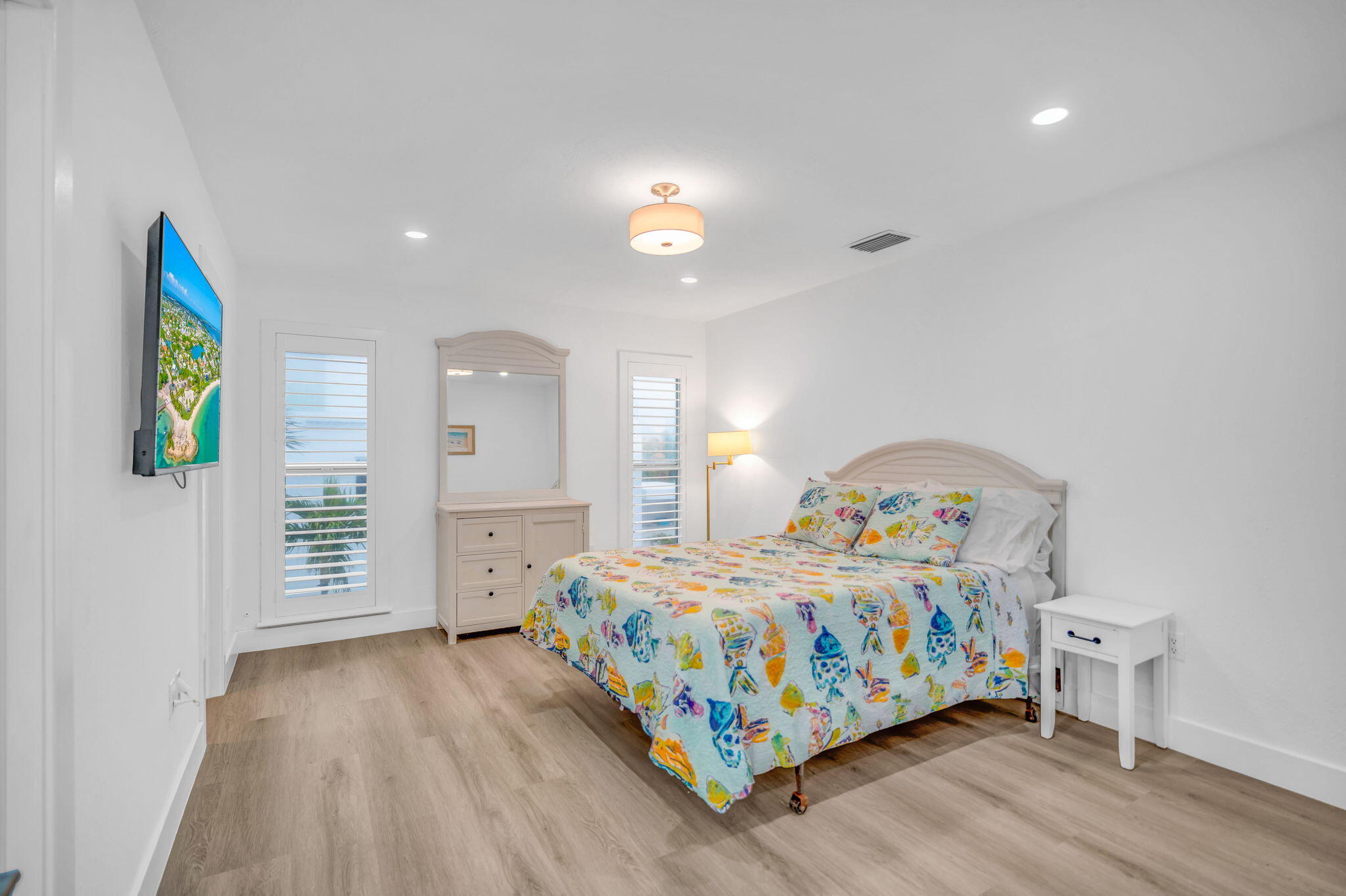 82 Tingler Lane Marathon, FL 33050 - Photo 18 of 54 a bedroom with a bed and a table