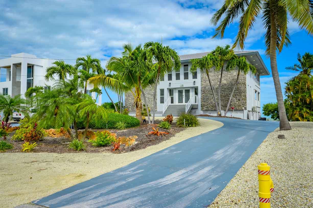 82 Tingler Lane Marathon, FL 33050 - Photo 2 of 54 a view of a house with swimming pool and sitting area