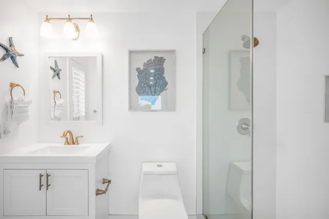 a bedroom with a bed and a table