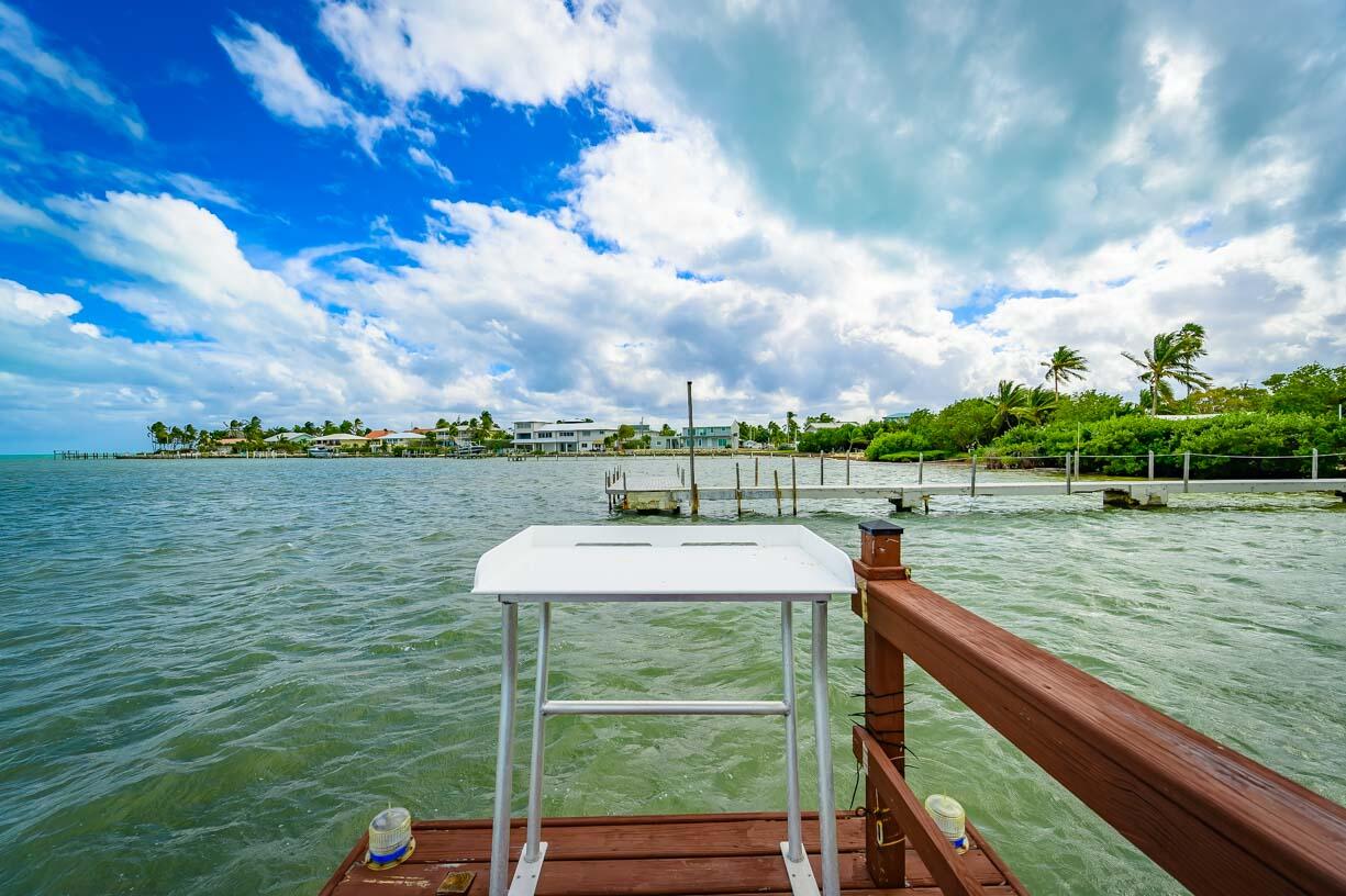 82 Tingler Lane Marathon, FL 33050 - Photo 35 of 54 a view of a lake from a balcony with outdoor space