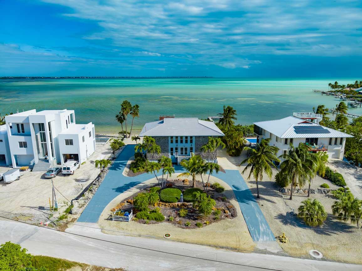 82 Tingler Lane Marathon, FL 33050 - Photo 4 of 54 a view of a swimming pool with an outdoor seating