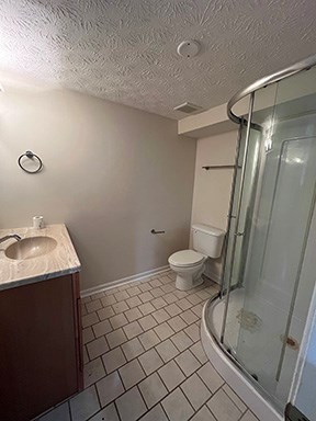 2008 Marilon Drive Columbus, GA 31906 - Photo 12 of 14 a bathroom with a granite countertop sink toilet and shower