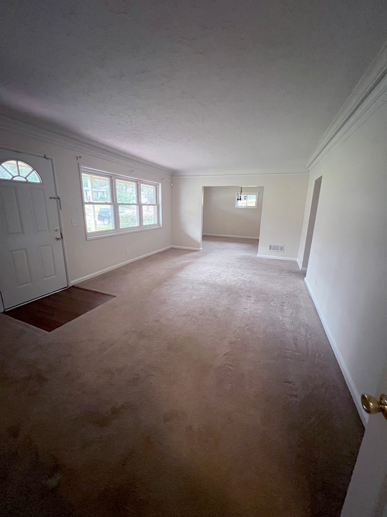 2008 Marilon Drive Columbus, GA 31906 - Photo 2 of 14 an empty room with windows and closet
