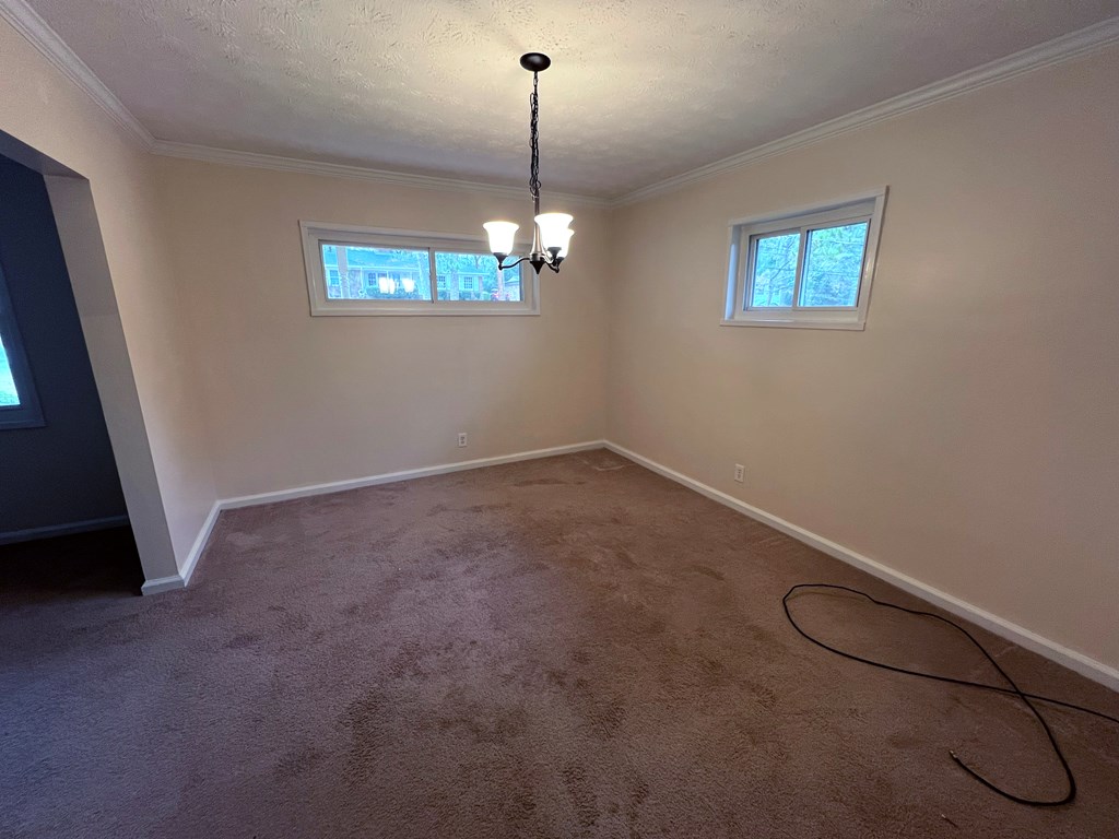 2008 Marilon Drive Columbus, GA 31906 - Photo 3 of 14 a view of a room with window and chandelier