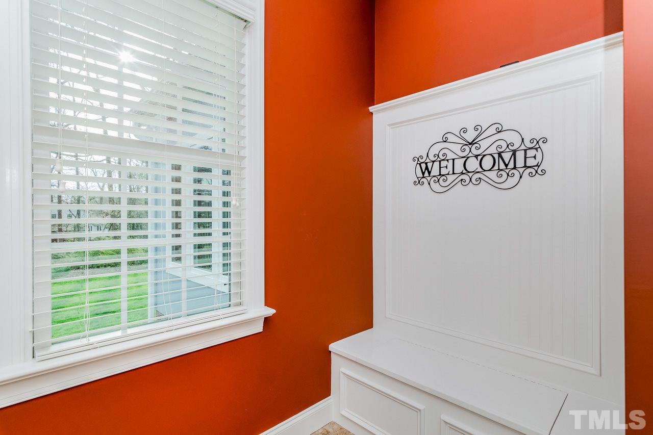 4201 Frost Court Raleigh, NC 27609 - Photo 18 of 25 a view of front door with yellow