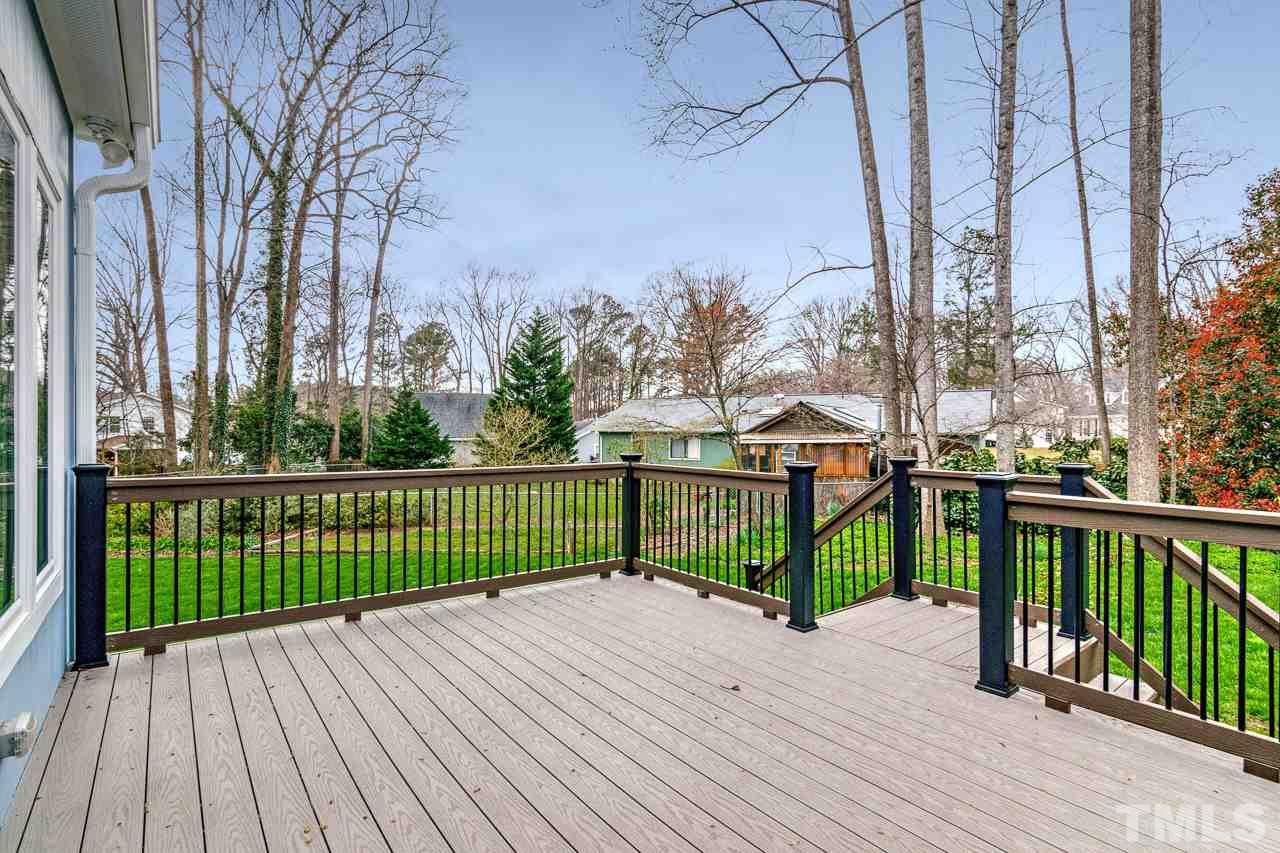 4201 Frost Court Raleigh, NC 27609 - Photo 5 of 25 a view of a wooden deck and city view