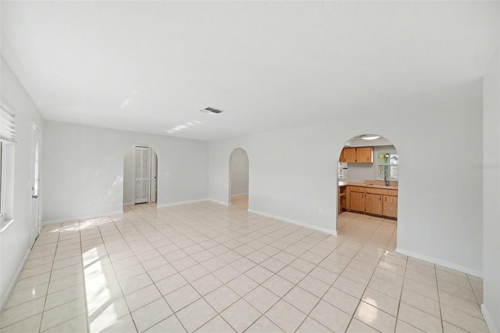 113 Ruskin Avenue Spring Hill, FL 34606 - Photo 8 of 32 a view of a livingroom with toys