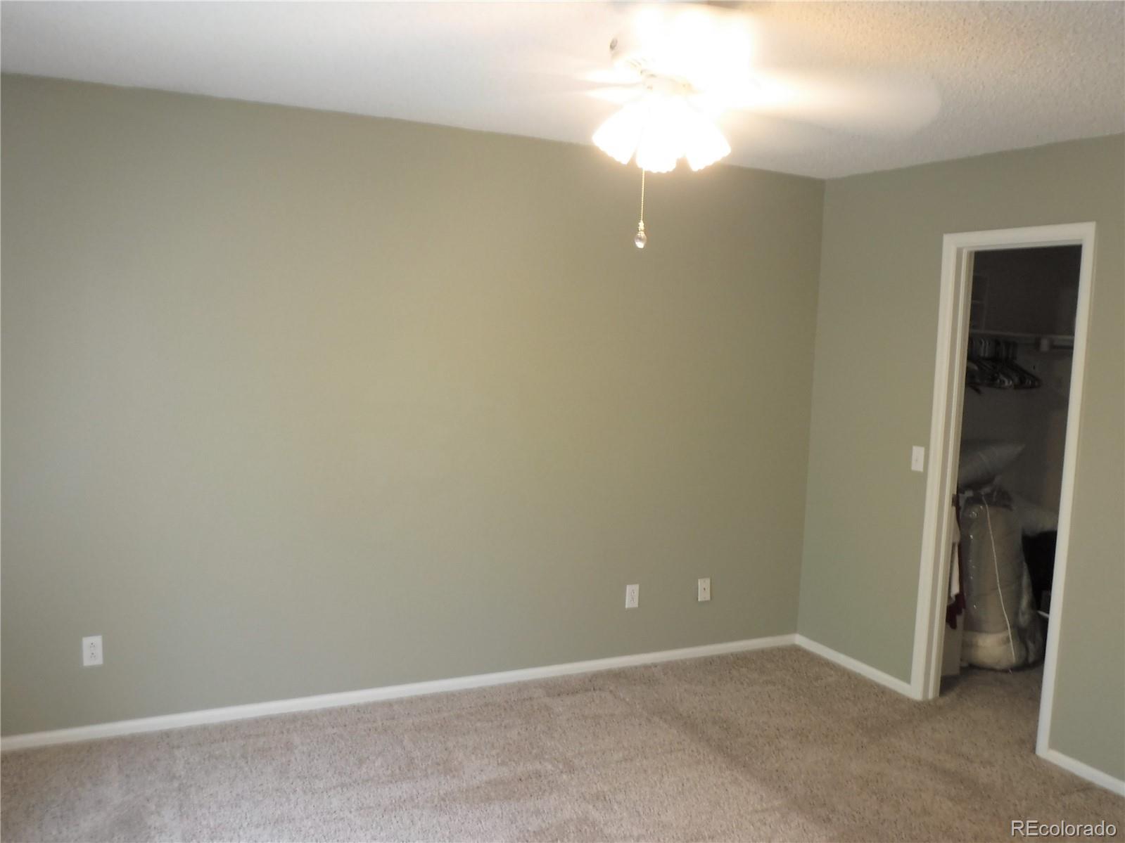 1149 Timbervale Trail Highlands Ranch, CO 80129 - Photo 22 of 32 a view of an empty room