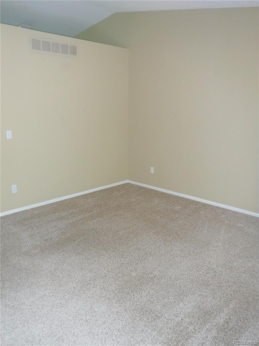 1149 Timbervale Trail Highlands Ranch, CO 80129 - Photo 6 of 32 a view of an empty room