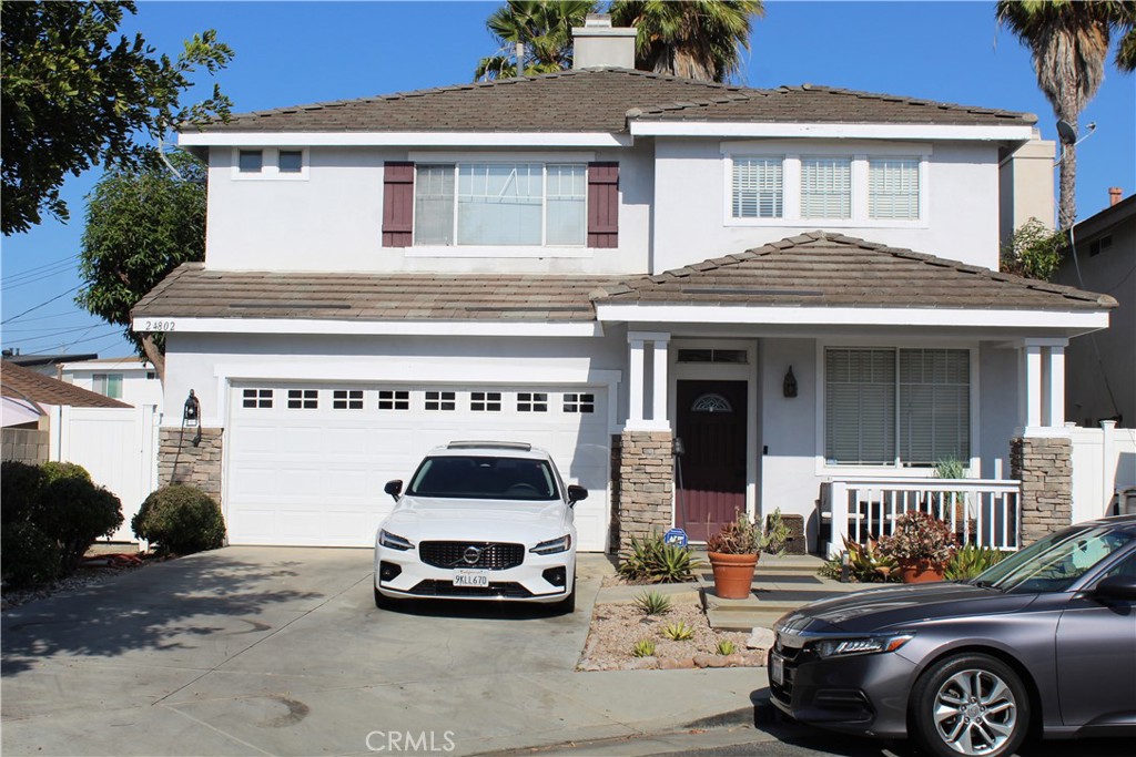 a car parked in front of a house