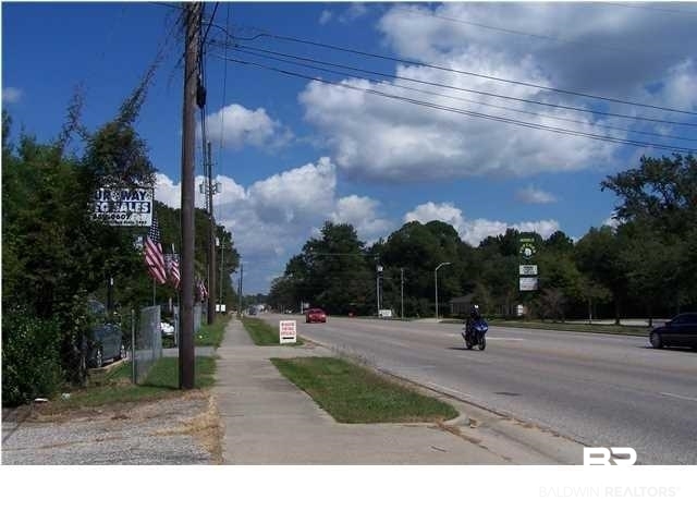 3346 Cottage Hill Road Mobile, AL 36606 - Photo 2 of 3 View of street with street lights, curbs, and sidewalks
