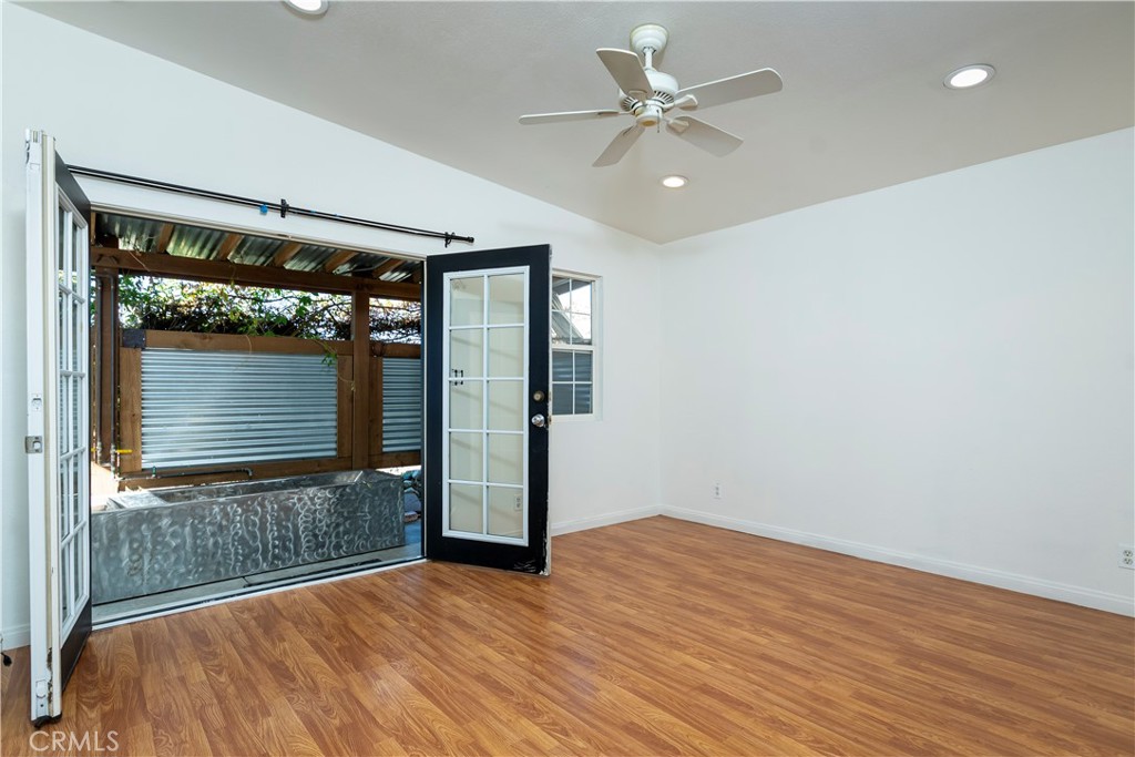 10161 Foothill Boulevard Sylmar, CA 91342 - Photo 16 of 65 a view of an empty room with a window