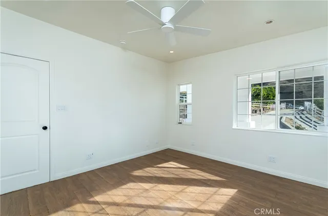 a view of a tree in a yard