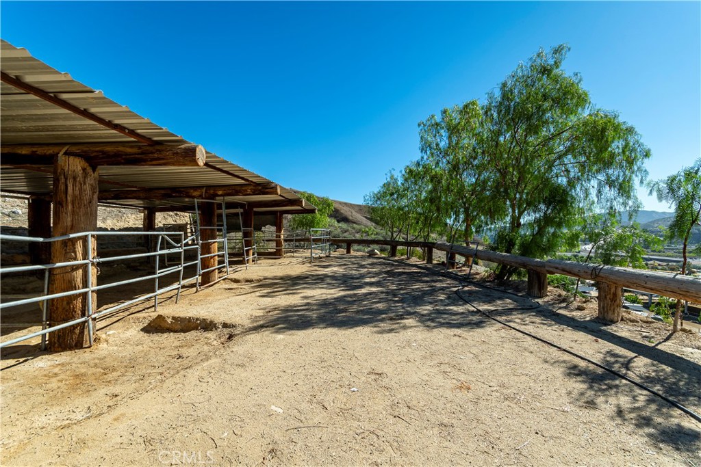 10161 Foothill Boulevard Sylmar, CA 91342 - Photo 43 of 65 a view of a house with a wooden fence