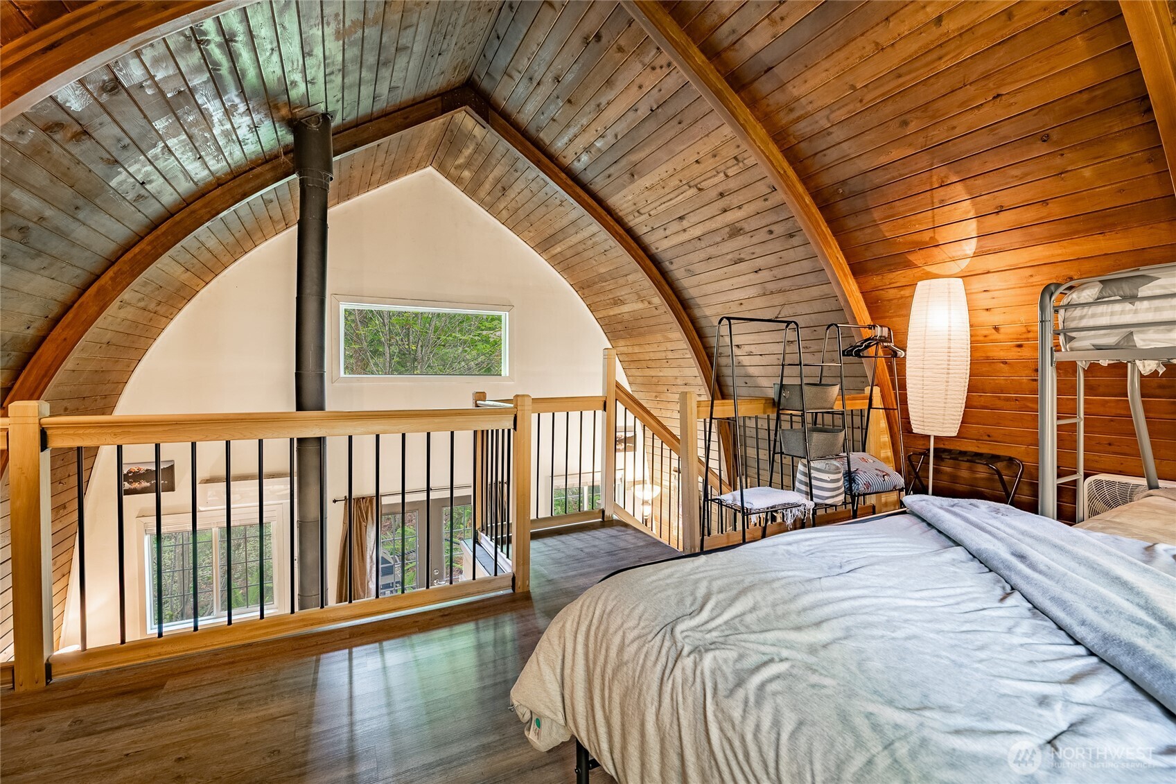 14001 Welcome Road Glacier, WA 98244 - Photo 25 of 39 a bedroom with a bed and a large window