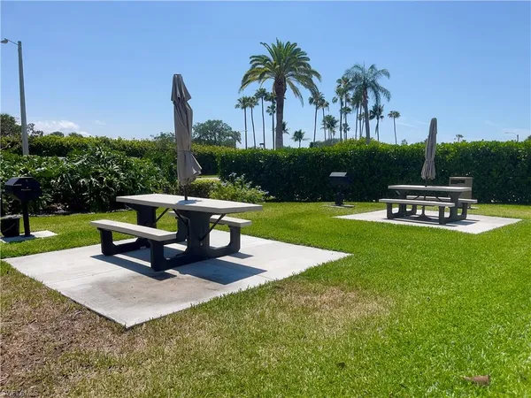 a bench sitting in the middle of a park