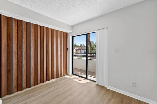 a bathroom with a shower and a toilet