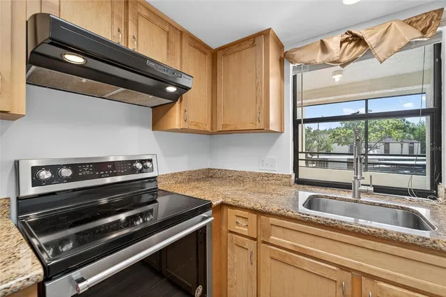 a view of a street with cars