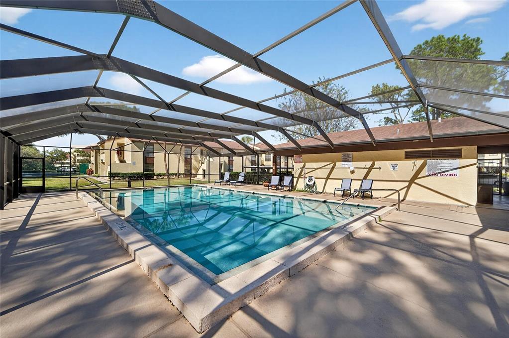 13610 South Village Drive, Unit 4209 Tampa, FL 33618 - Photo 53 of 54 a view of a backyard with a patio