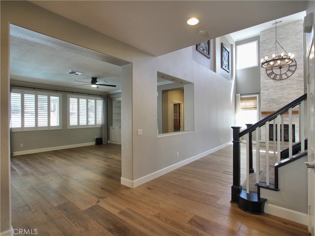 1442 Midnight Sun Drive Beaumont, CA 92223 - Photo 13 of 46 a view of an entryway with wooden floor