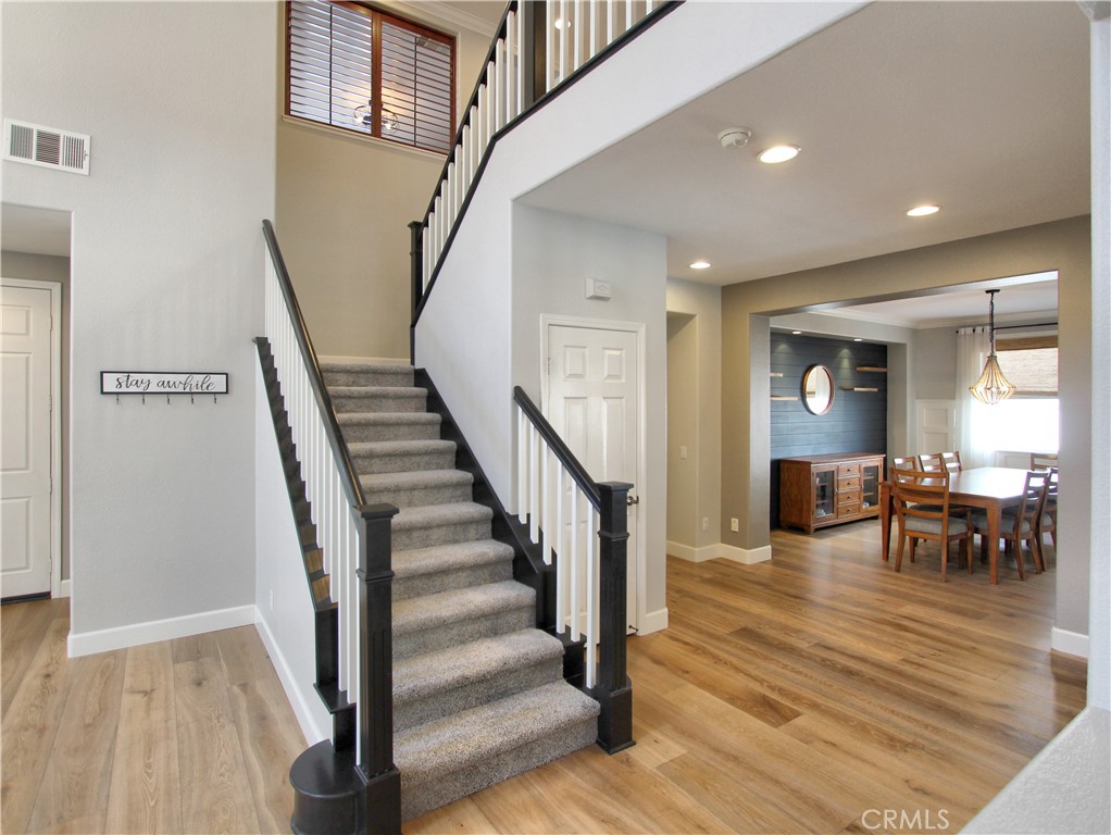 1442 Midnight Sun Drive Beaumont, CA 92223 - Photo 23 of 46 a view of entryway and hall with wooden floor