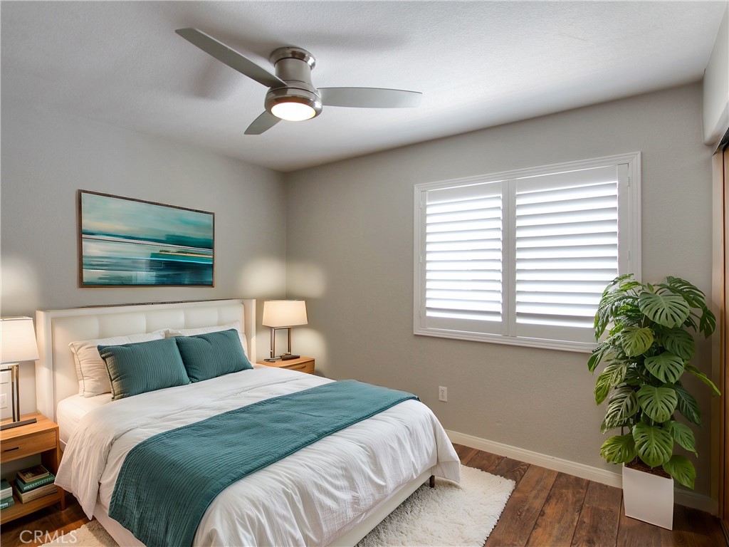 1442 Midnight Sun Drive Beaumont, CA 92223 - Photo 32 of 46 a bedroom with a bed and a window