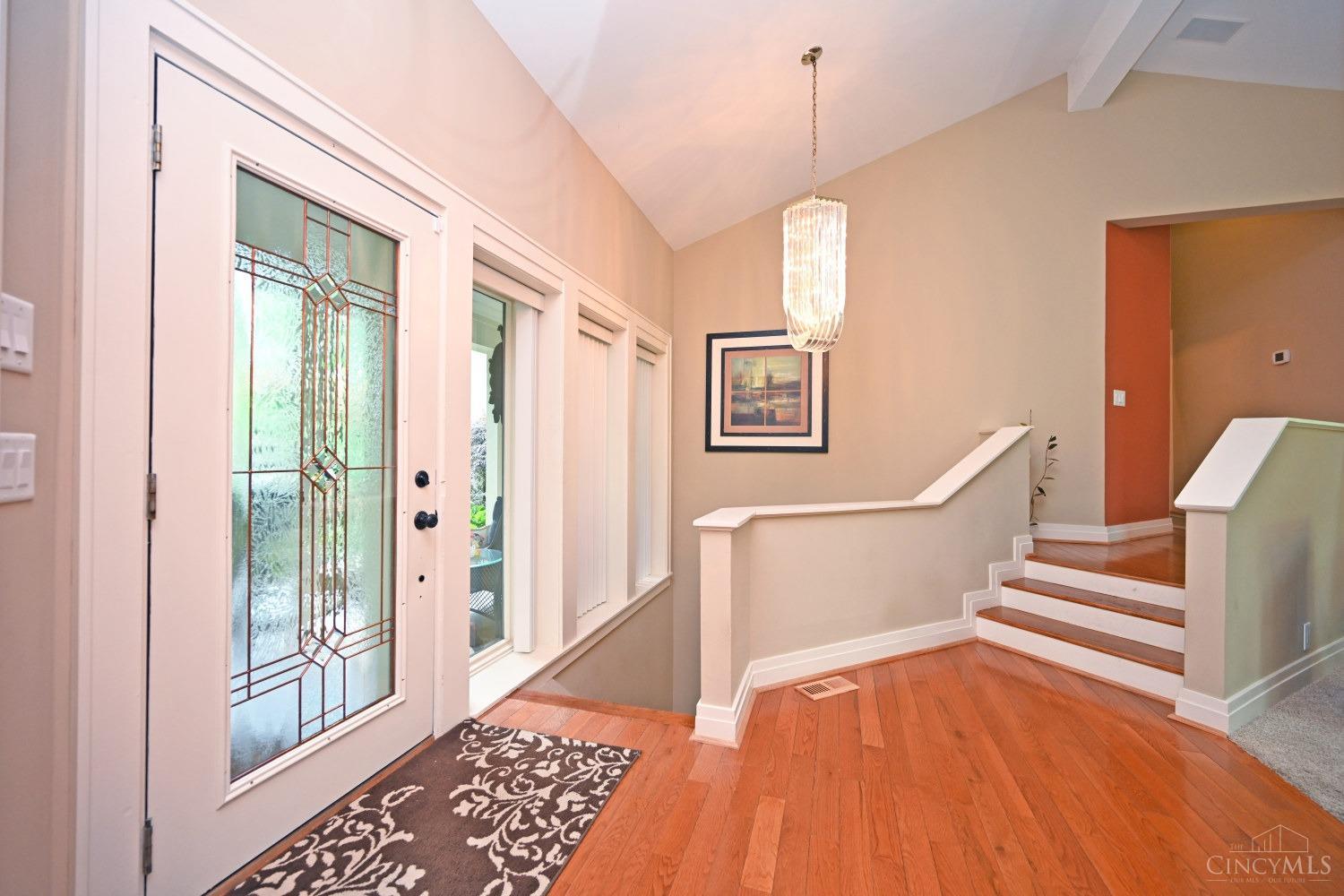 7811 Hopper Road Cincinnati, OH 45255 - Photo 4 of 48 Open foyer with hardwood floors and views of the woods