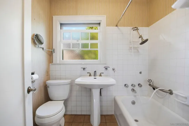 a bathroom with a sink and a toilet