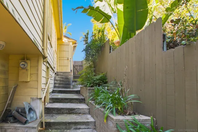 a view of a house with a flower plants