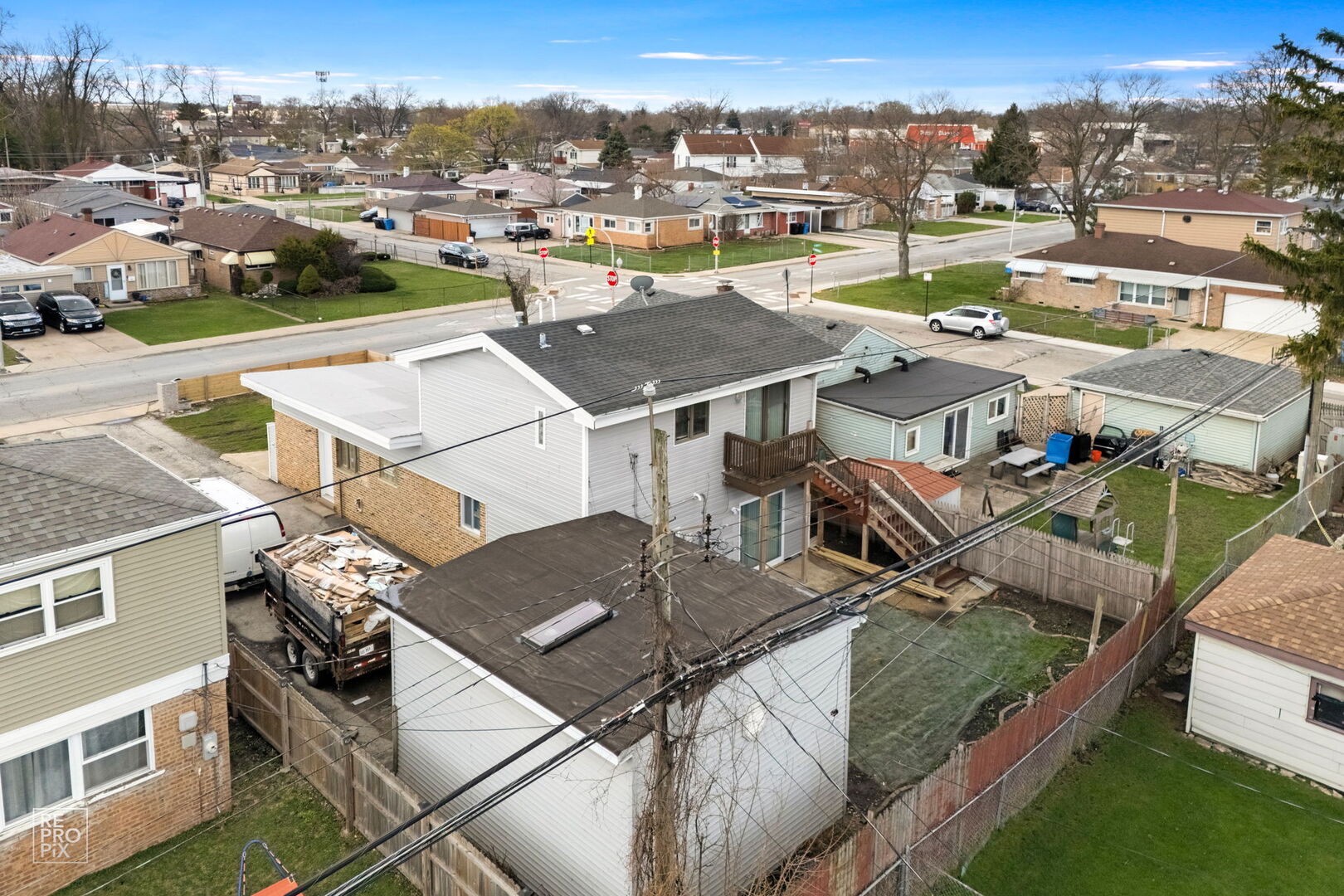 4680 West 83rd Street Chicago, IL 60652 - Photo 18 of 22 an aerial view of a house with a garden
