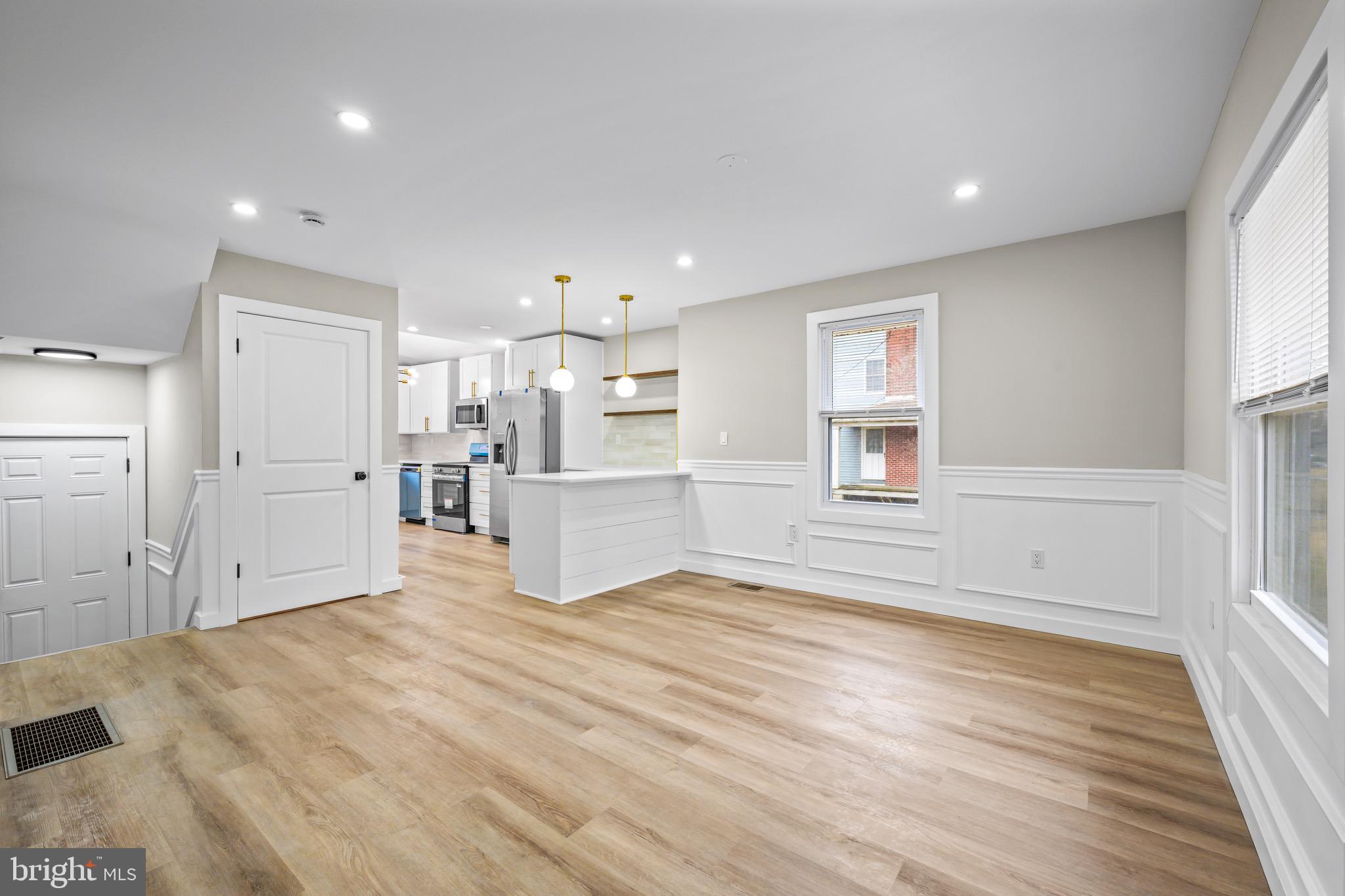 613 Hawks Bridge Road Carneys Point, NJ 08069 - Photo 14 of 38 a view of a kitchen with wooden floor and a sink