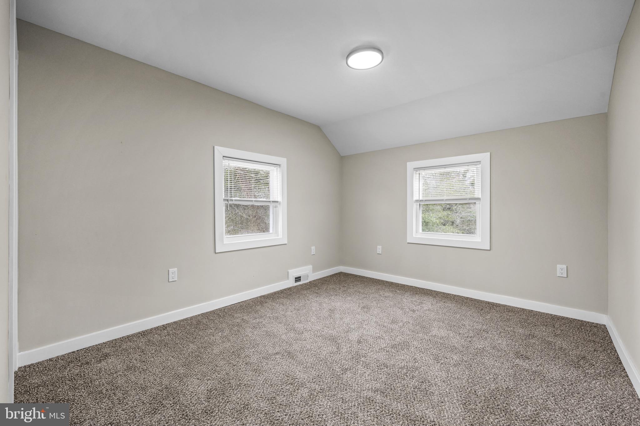 613 Hawks Bridge Road Carneys Point, NJ 08069 - Photo 19 of 38 an empty room with a window