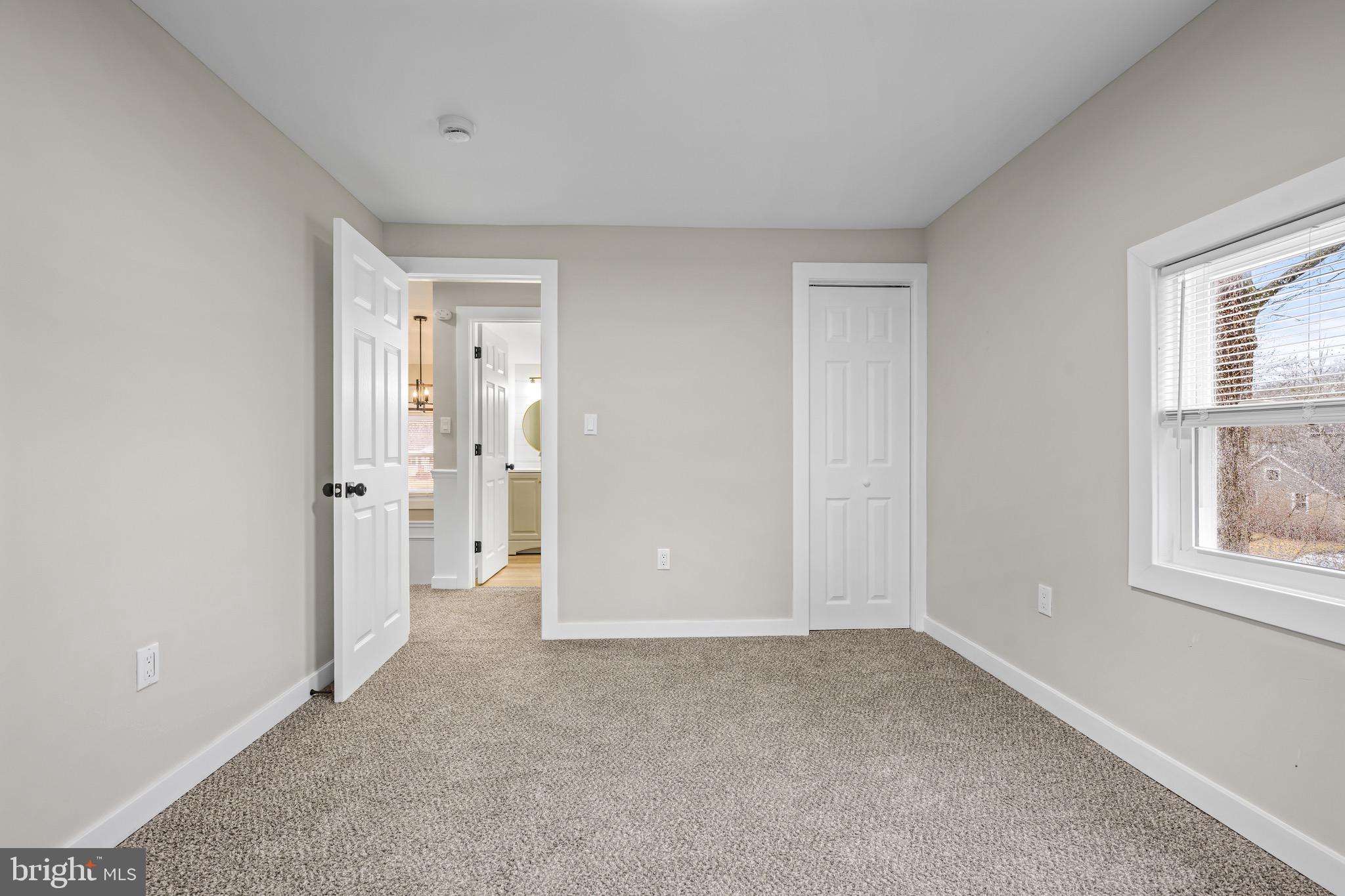 613 Hawks Bridge Road Carneys Point, NJ 08069 - Photo 20 of 38 an empty room with windows and closet