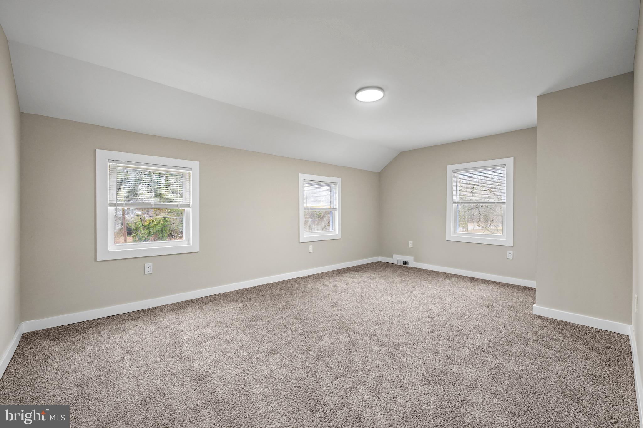 613 Hawks Bridge Road Carneys Point, NJ 08069 - Photo 22 of 38 a view of an empty room with a window