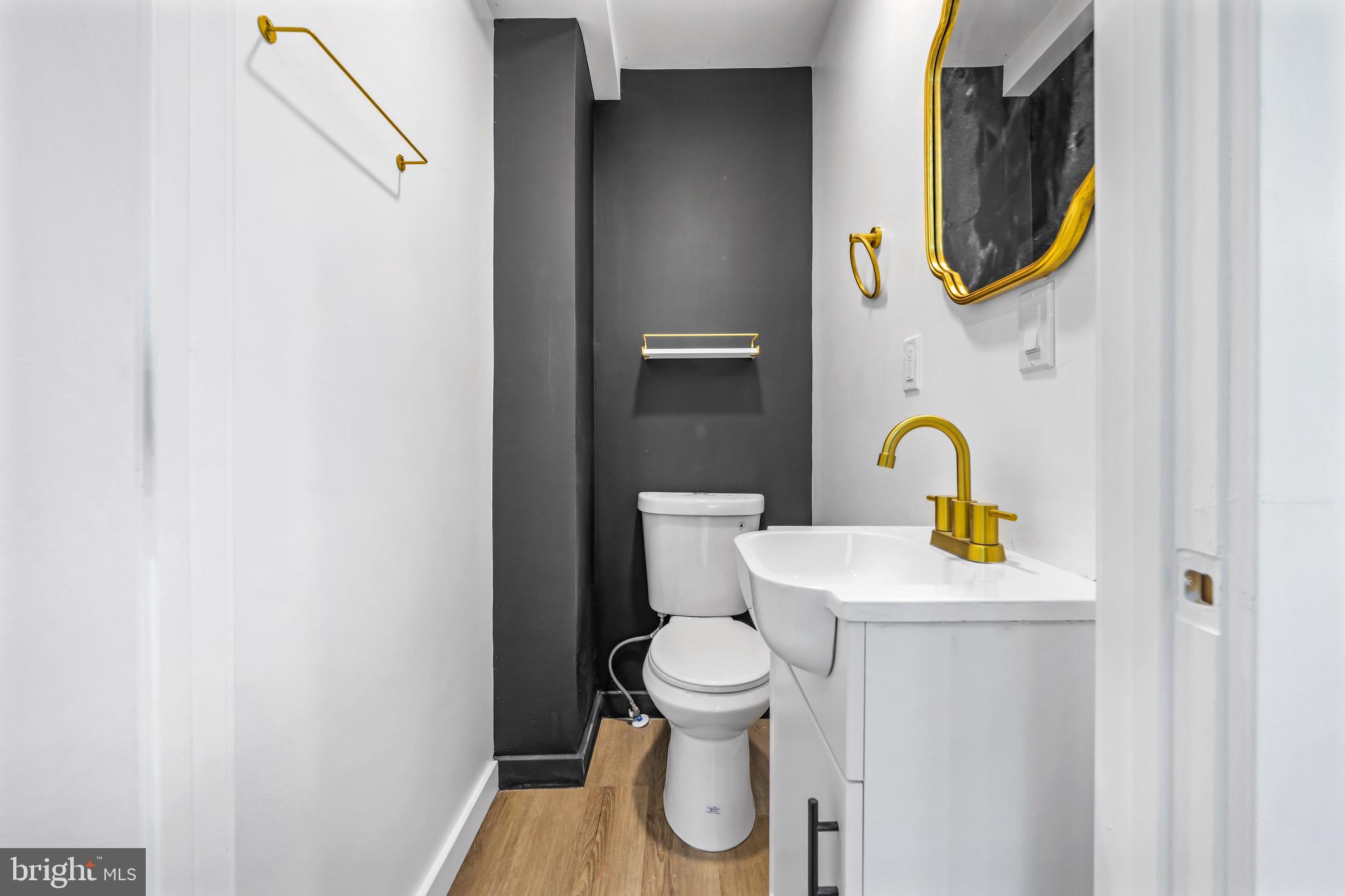 613 Hawks Bridge Road Carneys Point, NJ 08069 - Photo 26 of 38 a bathroom with a toilet and a sink