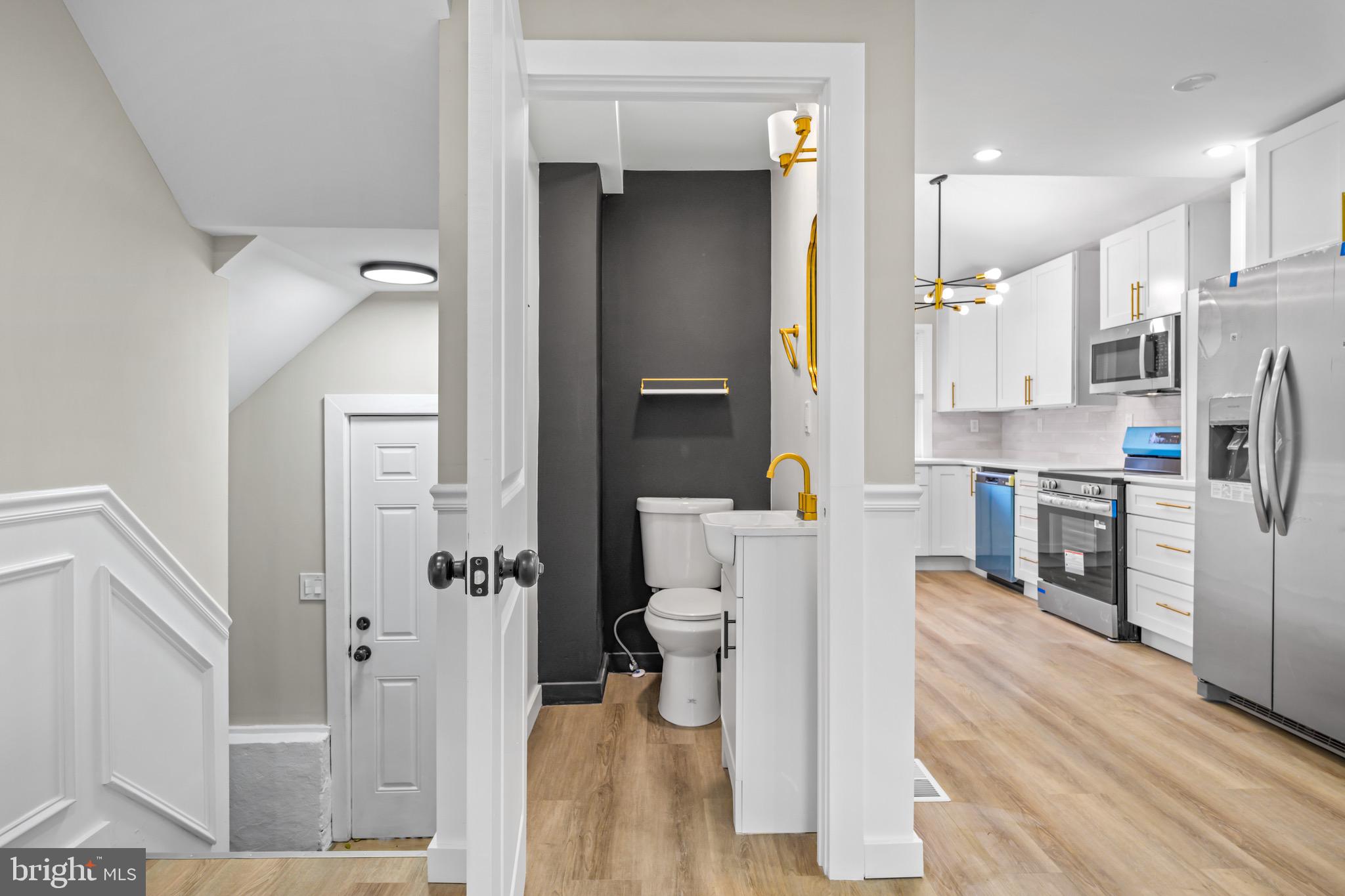 613 Hawks Bridge Road Carneys Point, NJ 08069 - Photo 27 of 38 a bathroom with a sink and a toilet