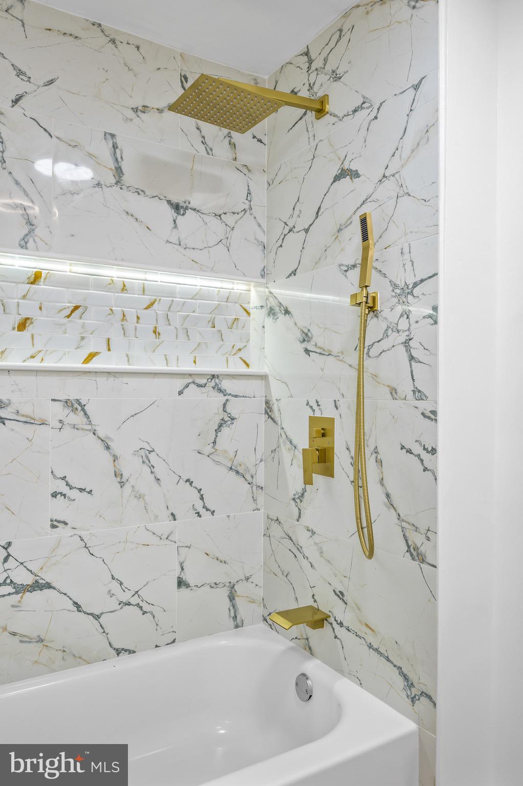 613 Hawks Bridge Road Carneys Point, NJ 08069 - Photo 29 of 38 a bathroom with a bathtub and shower