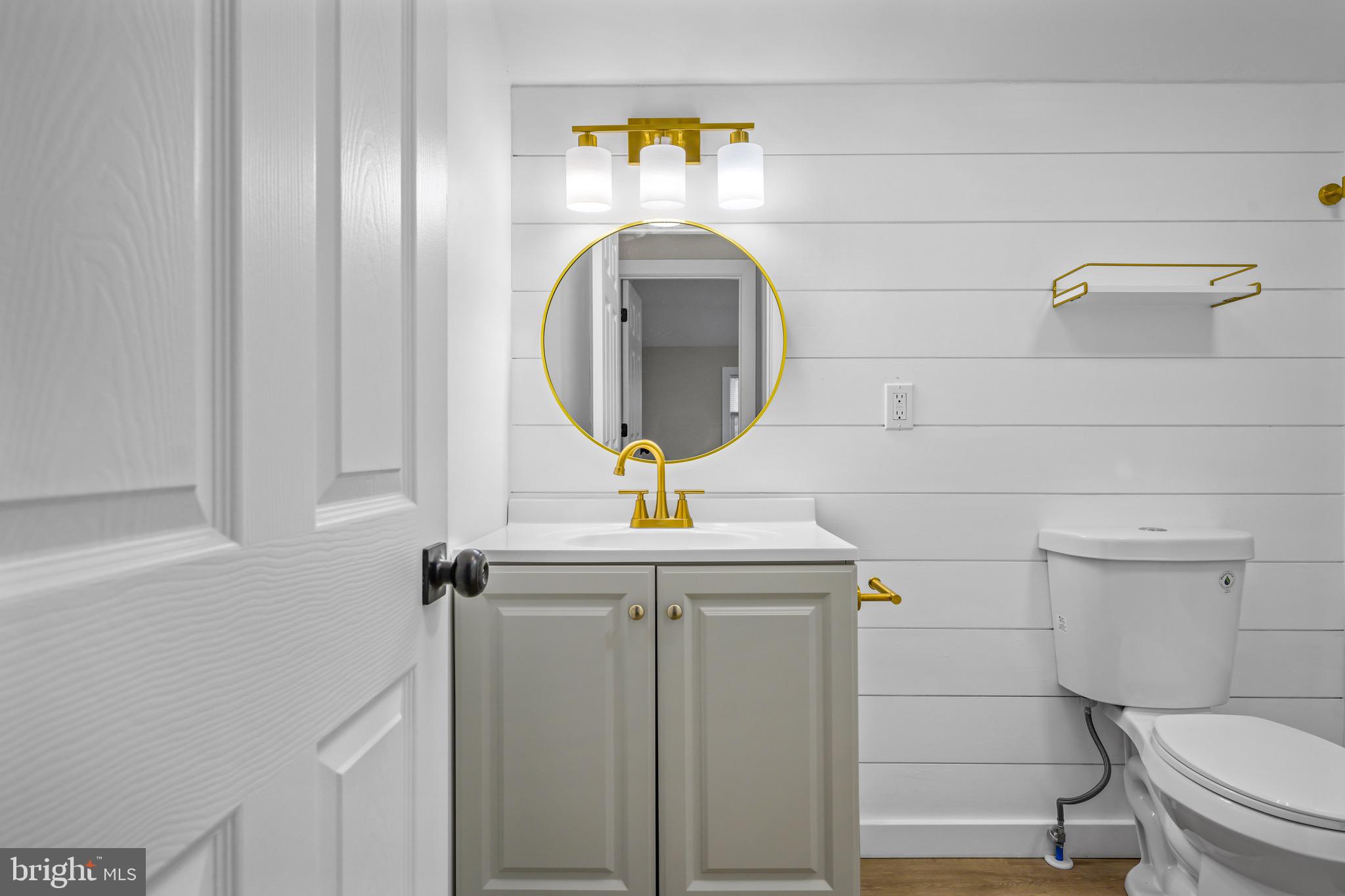 613 Hawks Bridge Road Carneys Point, NJ 08069 - Photo 31 of 38 a bathroom with a toilet and a sink