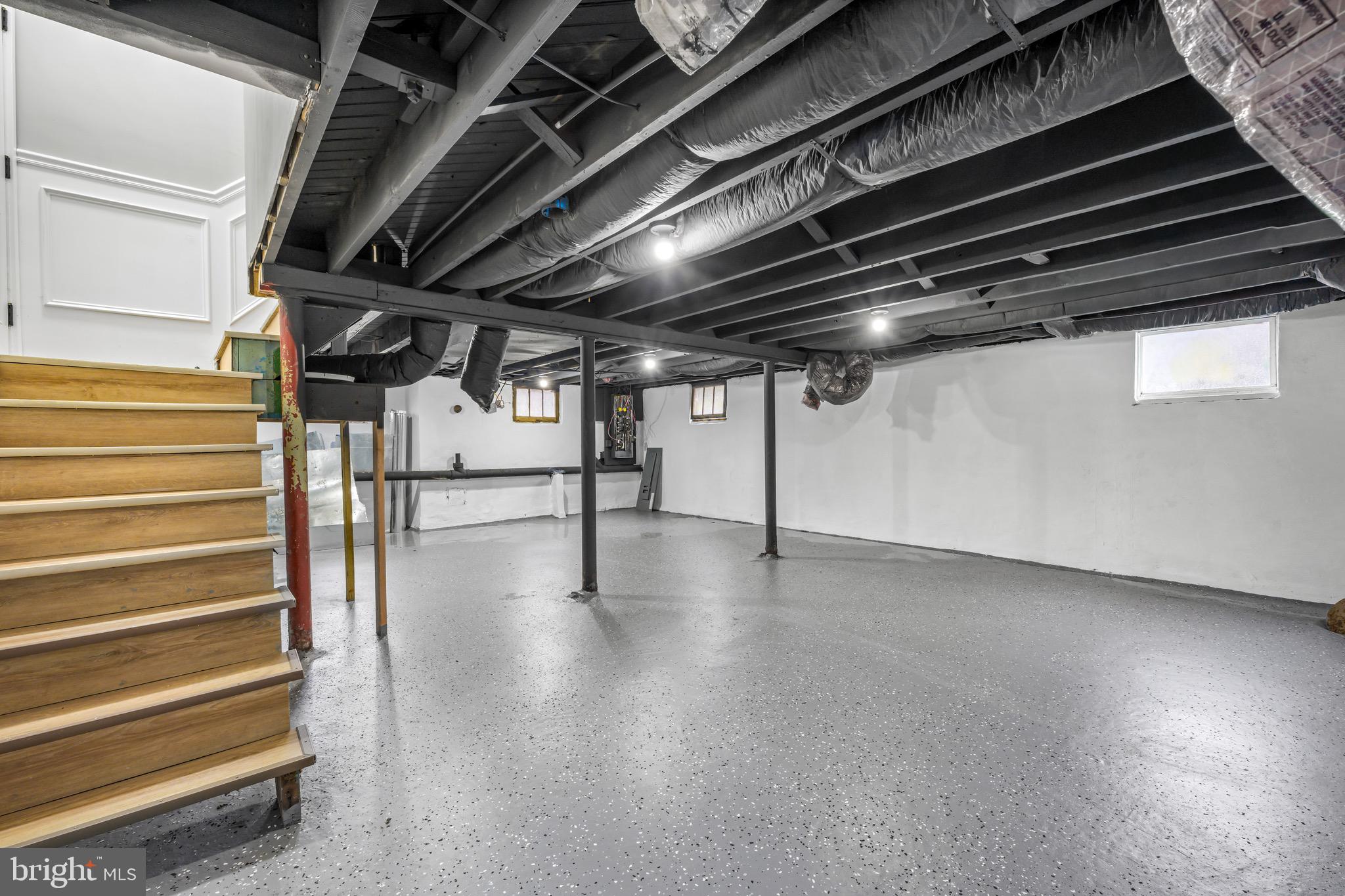 613 Hawks Bridge Road Carneys Point, NJ 08069 - Photo 33 of 38 a view of an empty room with wooden floor