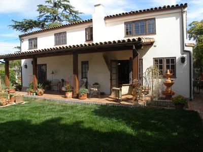 318 Mohawk Road Santa Barbara, CA 93109 - Photo 12 of 15 a front view of a house with patio and yard