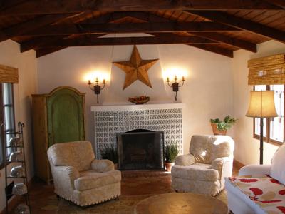 318 Mohawk Road Santa Barbara, CA 93109 - Photo 3 of 15 a living room with furniture and a fireplace