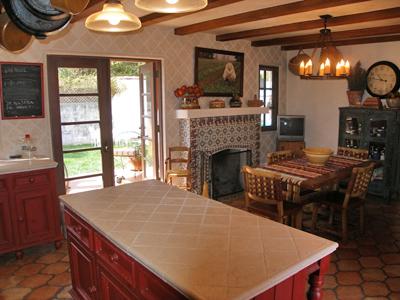 318 Mohawk Road Santa Barbara, CA 93109 - Photo 10 of 15 a living room with furniture a flat screen tv and a fireplace