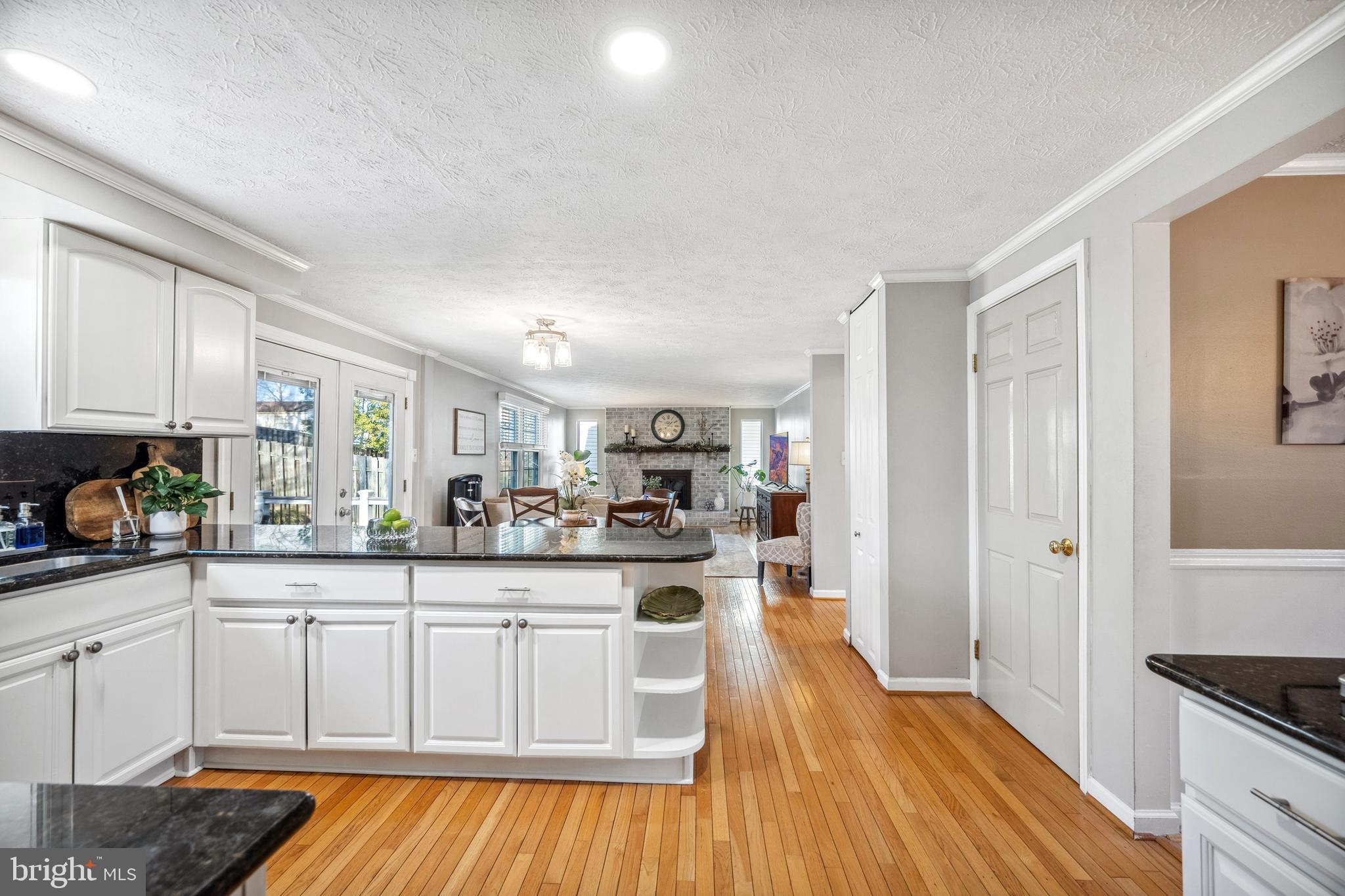 10655 John Ayres Drive Fairfax, VA 22032 - Photo 11 of 57 a kitchen with stainless steel appliances granite countertop a sink and cabinets