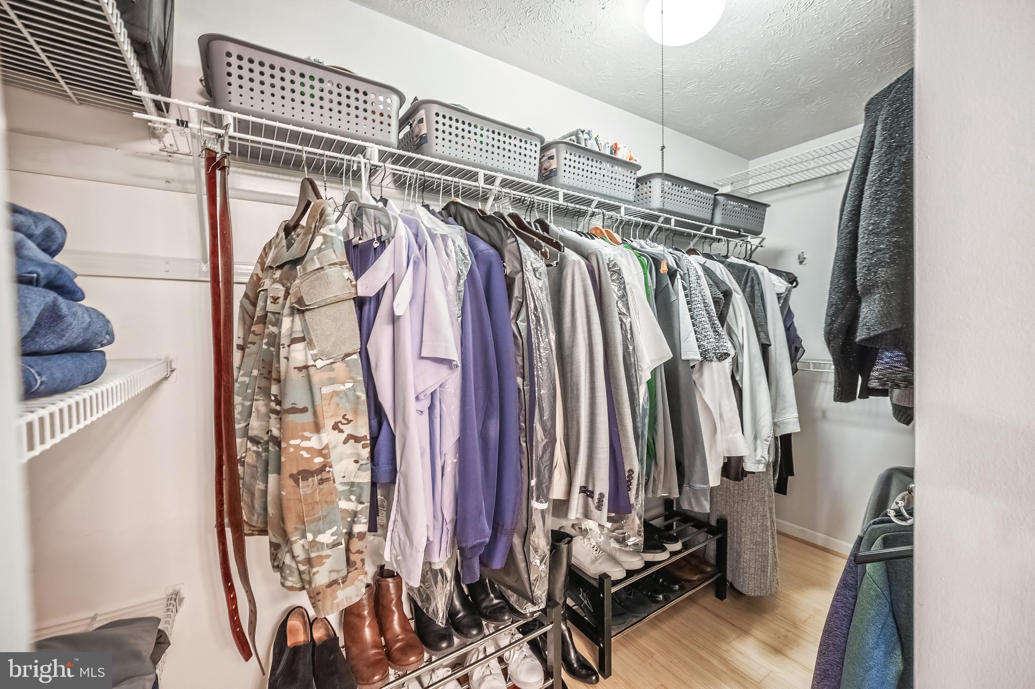 10655 John Ayres Drive Fairfax, VA 22032 - Photo 23 of 57 a view of walk in closet with clothes