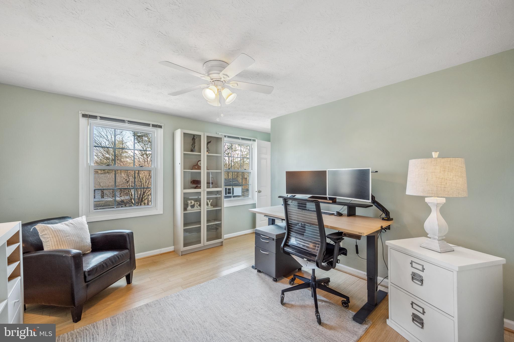 10655 John Ayres Drive Fairfax, VA 22032 - Photo 24 of 57 a view of a livingroom with workspace and a couch