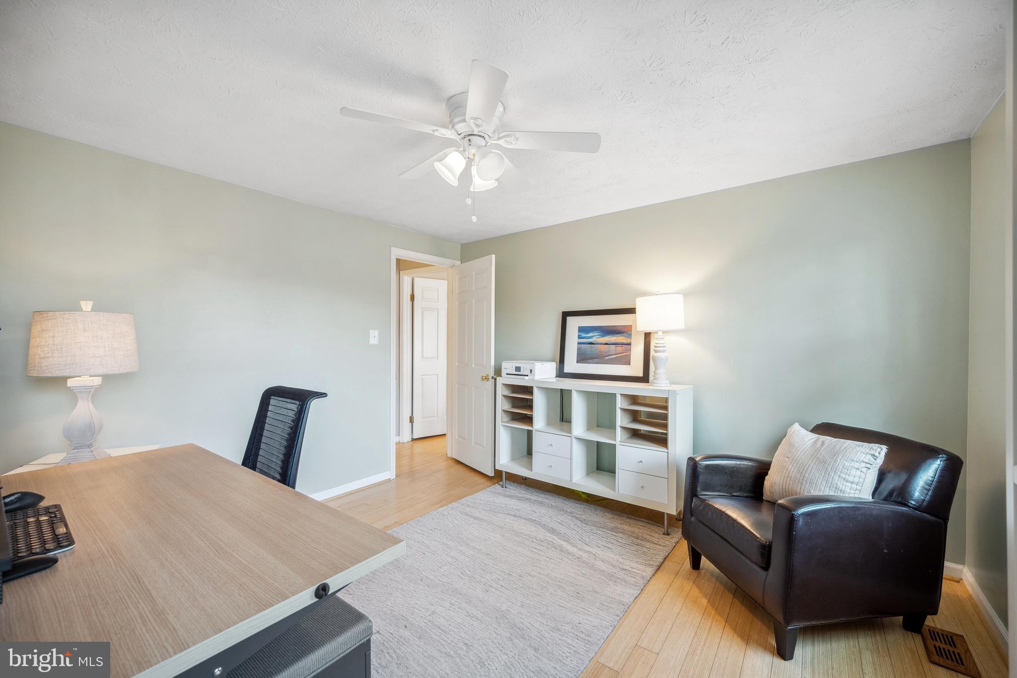 10655 John Ayres Drive Fairfax, VA 22032 - Photo 25 of 57 a bedroom with a bed and a couch