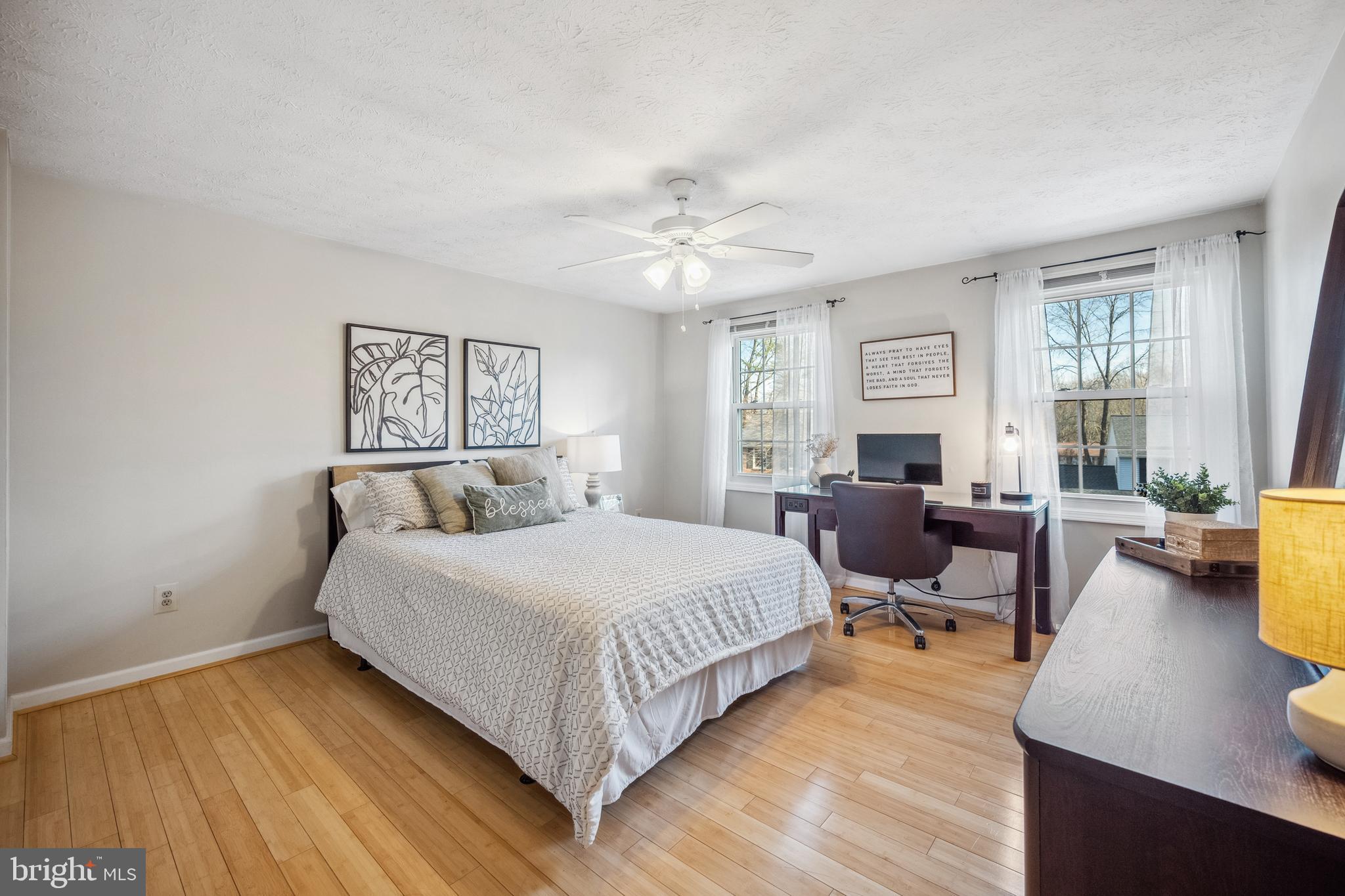 10655 John Ayres Drive Fairfax, VA 22032 - Photo 26 of 57 a bedroom with a bed couch and a large window